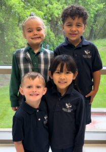 Smiling Catholic school students in uniform