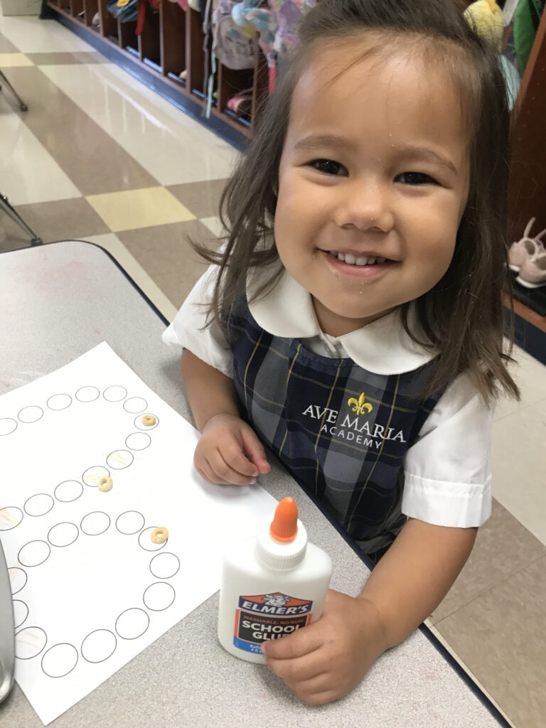 Happy Catholic preschool student