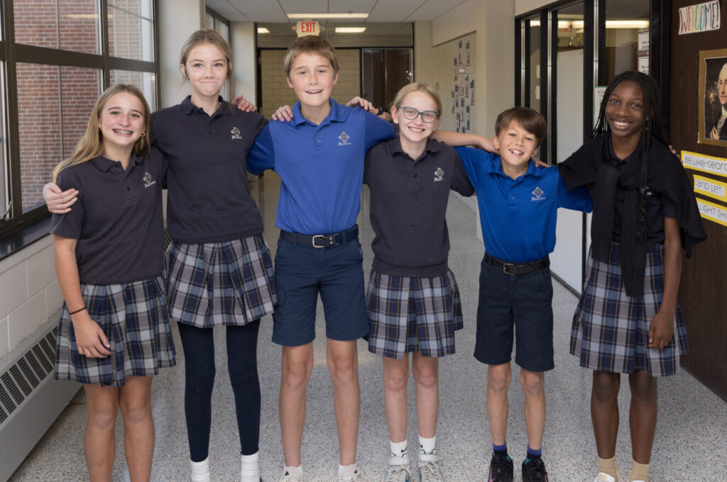 Smiling Catholic school students in uniform